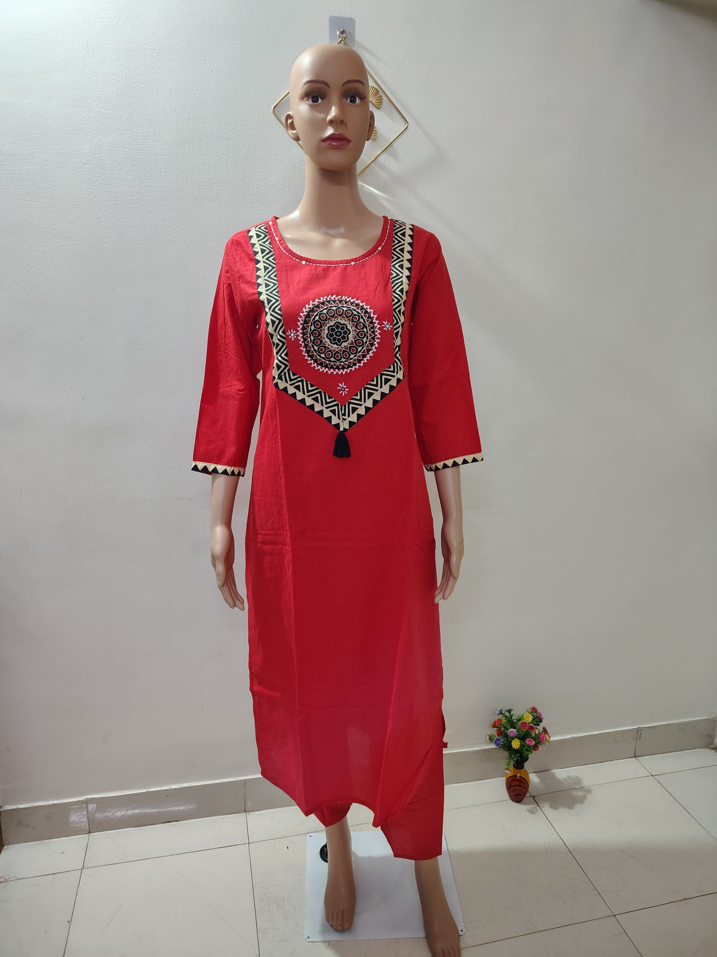 Red Straight Kurta Set paired with a Black Printed Dupatta
