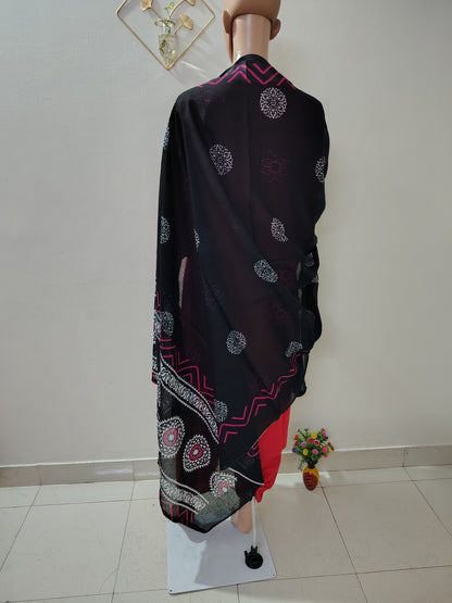Red Straight Kurta Set paired with a Black Printed Dupatta